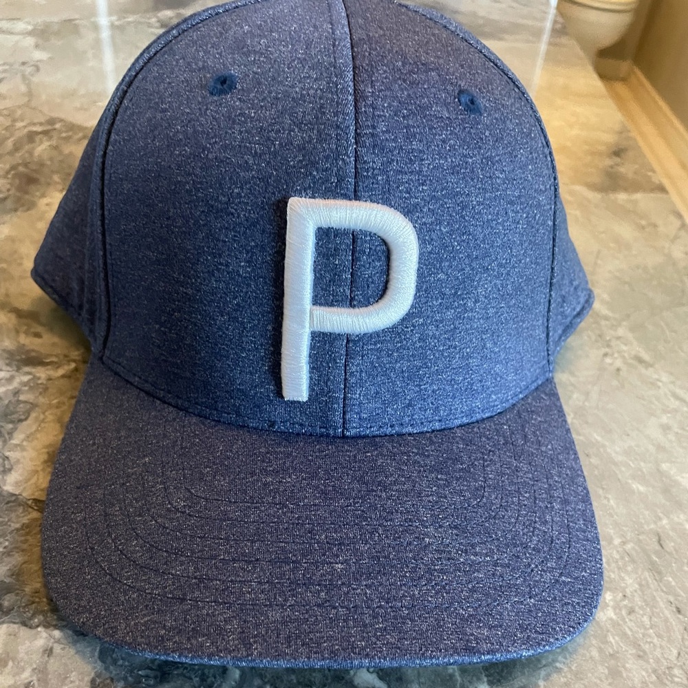 Men’s Puma Tour hat.